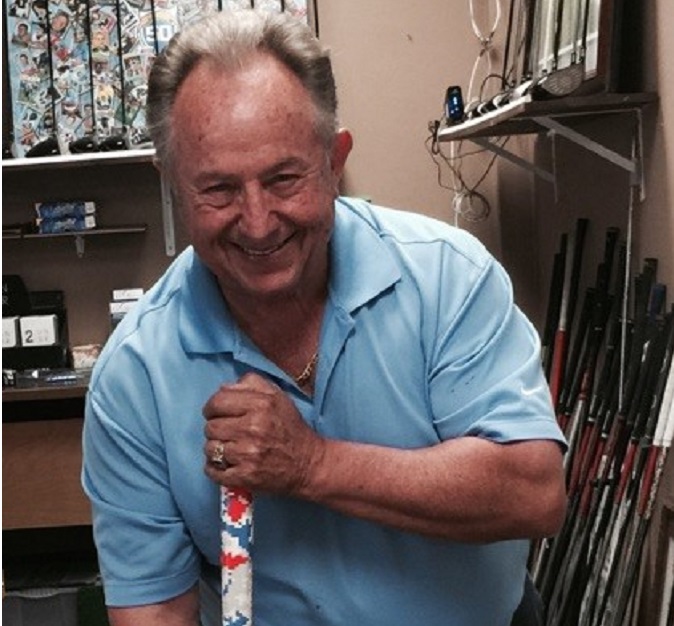 Mr. Benjamin Jones holding a face-on putter at the USA Golf Masters storefront in El Cajon, California.